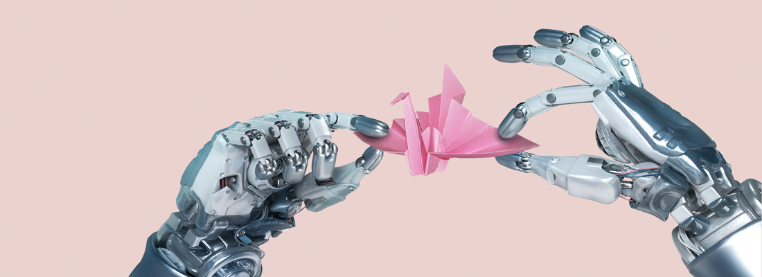 Robot hands holding an origami bird